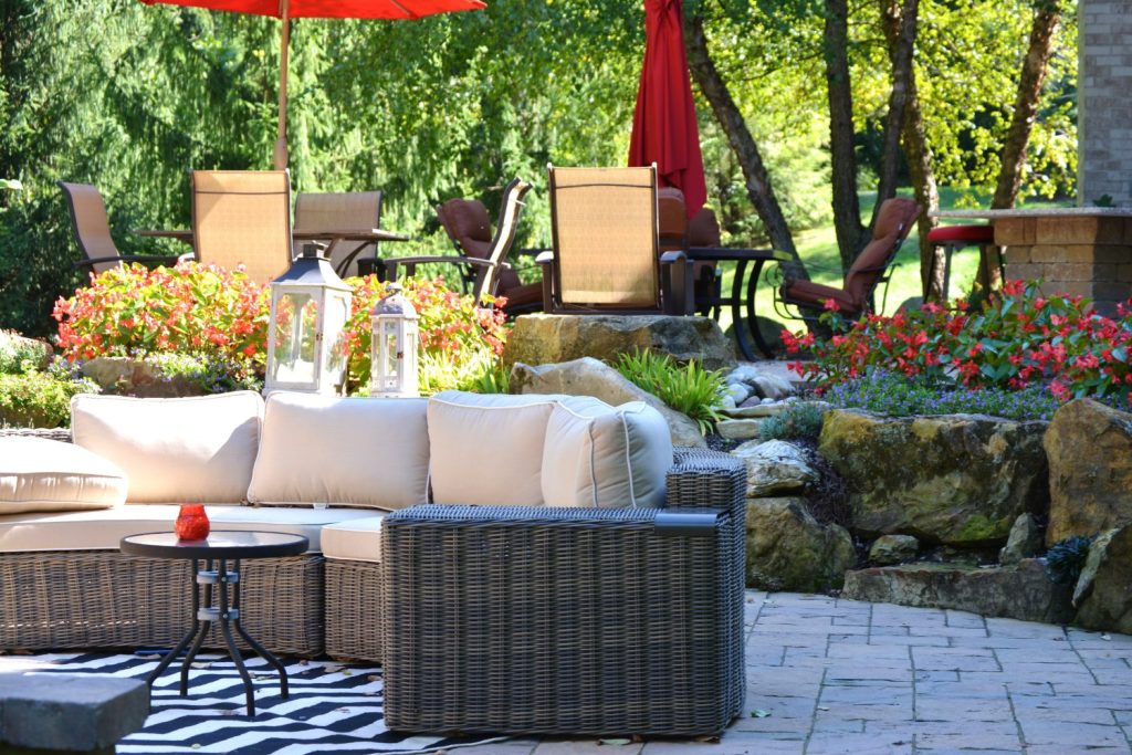 Custom paver patio with outdoor furniture by Plant Studio Landscape in Muncie, Indiana