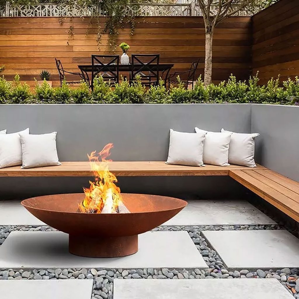 Outdoor living fire feature and hardscape in a Muncie Indiana yard built by Plant Studio Landscape