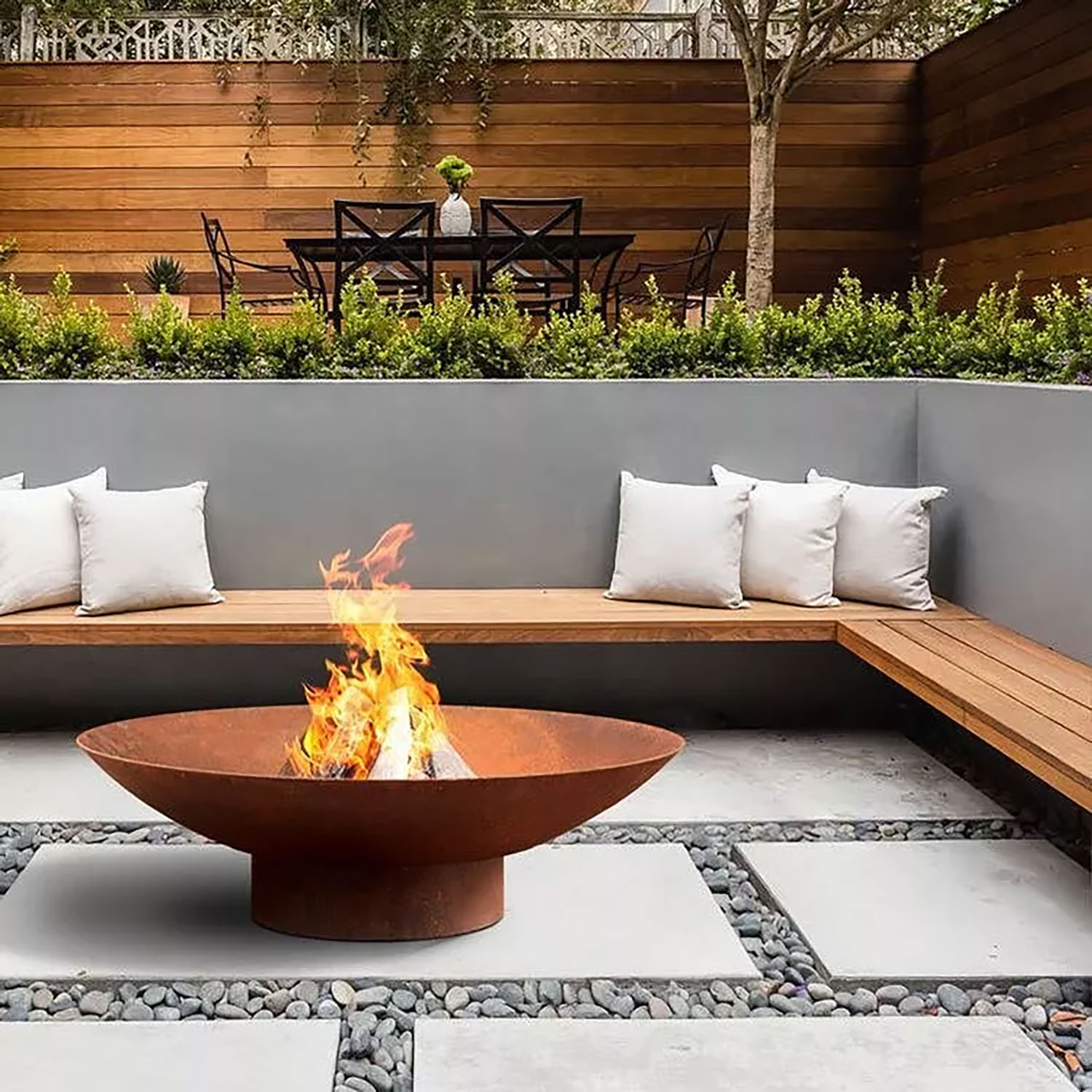 Fire Features 1 Wood-burning fire pit by Plant Studio Landscape on a Muncie property